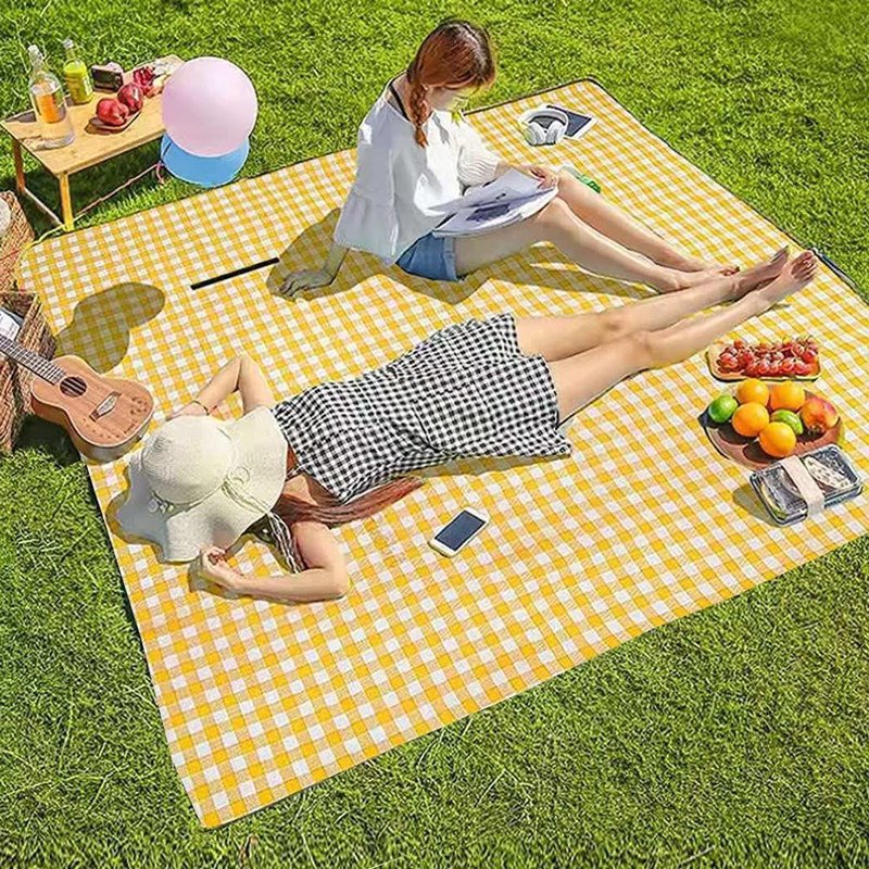 Picnic teppi á grasi